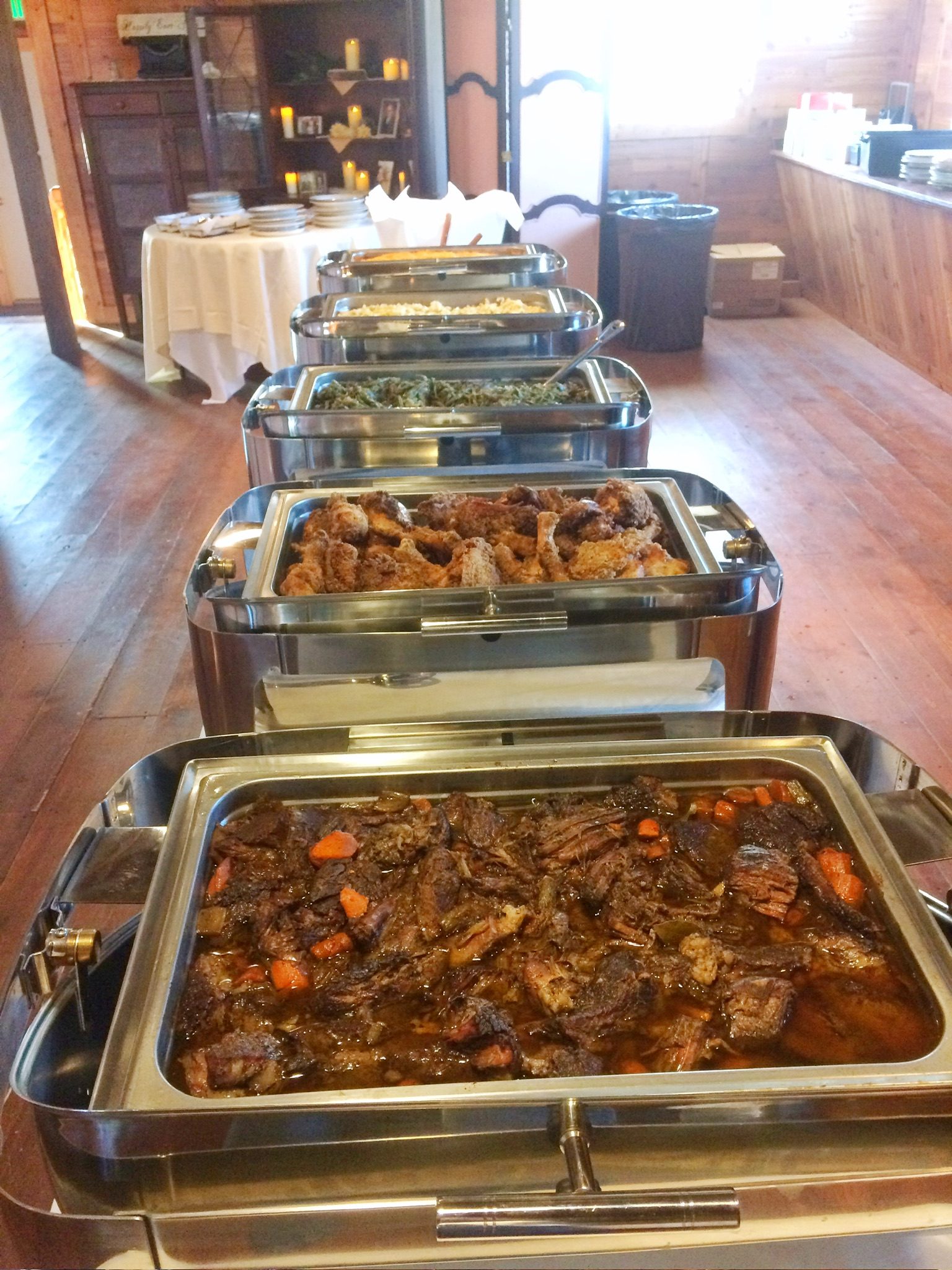 Pot roast with carrots and buttermilk fried chicken in chafing dishes